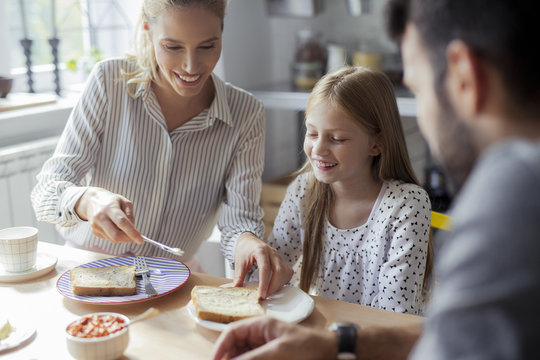 Family Having Breakfast Together