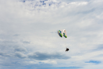 Obraz na płótnie Canvas paraplane flying high up