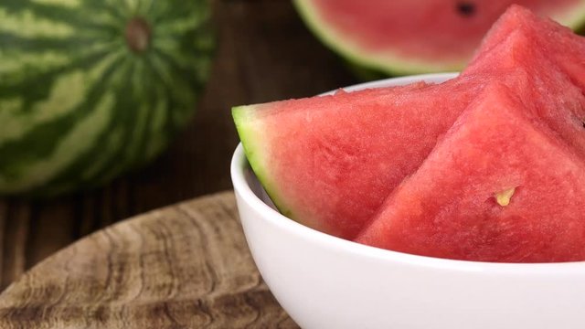 Rotating Pieces of Water Melon (seamless loopable 4K UHD footage)