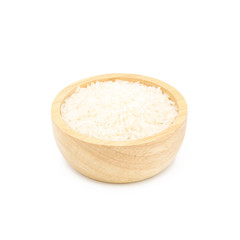 Rice in a wooden cup isolated on white background