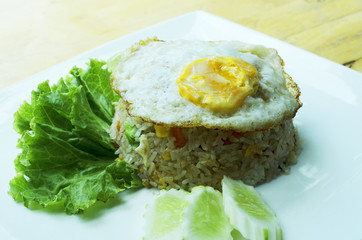 Crab Fried Rice with Fried Egg on white dish with macro close up for Thai food style concept