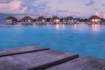 Fototapeta na wymiar Wonderful twilight time at tropical beach resort in Maldives