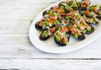 Vinaigrette mussels served on a plate