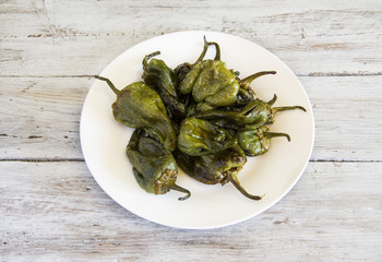 Fried peppers served on a plate