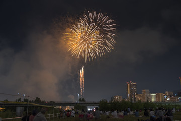 Toyohira River Fireworks, this festival is regarded as Hokkaido most popular fireworks festival over 4000 fireworks light up the night sky over Sapporo, Japan. Image show noise due night shot.