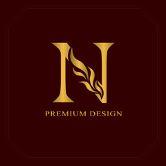Gold Elegant letter N. Graceful style. Calligraphic beautiful logo. Vintage drawn emblem for book design, brand name, business card, Restaurant, Boutique, Hotel. Vector illustration