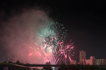 Toyohira River Fireworks, this festival is regarded as Hokkaido most popular fireworks festival over 4000 fireworks light up the night sky over Sapporo, Japan. Image show noise due night shot.