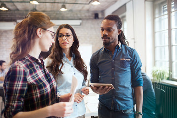 Picture of group of young perspective designers discussing