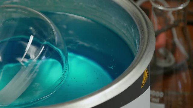 Flask and Tubes in Laboratory Ultra Sonic Devices Rotating and Destilling Chemicals