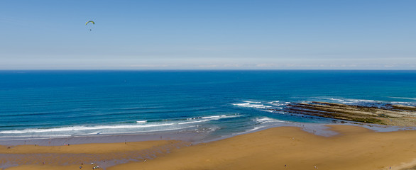 Paragliding over the beach in Sopelana