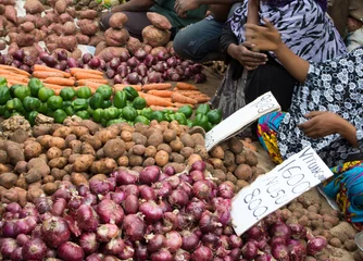 Fotobehang Sale of vegetables in the bazaar in East Africa. Selective focus. © vladk213