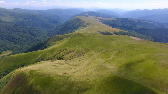 Beautiful summer aerial flight over mountains in Ukraine