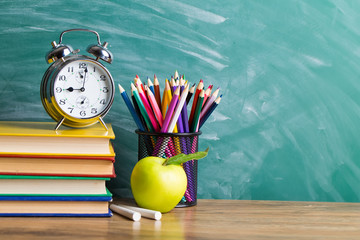 School supplies on the background of the school board