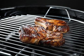 Tasty steaks on barbecue grill