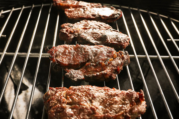 Tasty steaks on barbecue grill