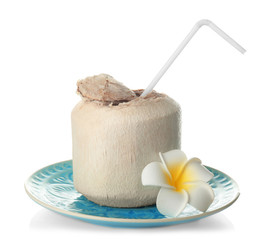 Plate with fresh coconut water in nut on white background © Africa Studio