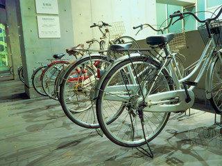 Bicycles in a row parked at outdoors, located in Tokyo