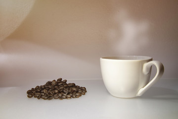 Coffee cup and coffee beans