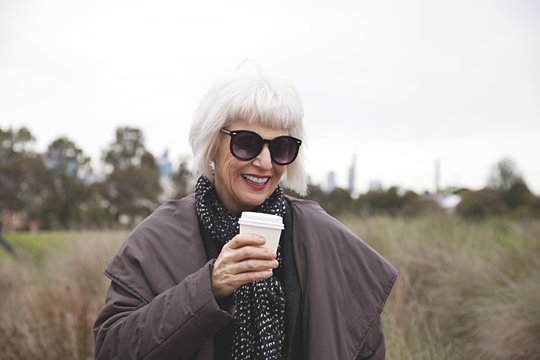 Older stylish lady in the park