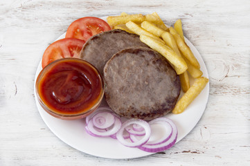 Meat and Vegetable Burger with French Fries.