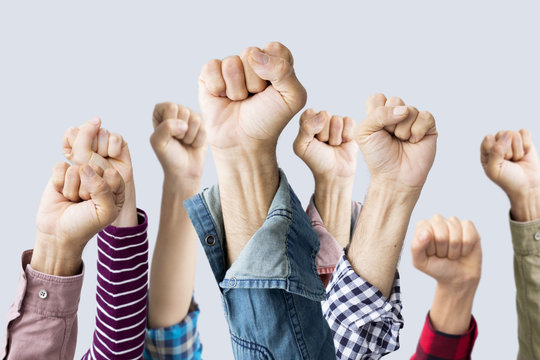 Group of fists raised in air