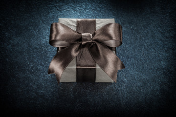 Gift box on black background