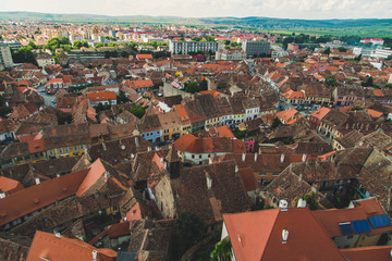 Fototapeta na wymiar Old red roofs of wonderful town Sibiu in Transylvania, Romania