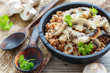Delicious buckwheat with fried mushrooms and onions.