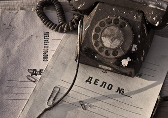 Old phone on documents
