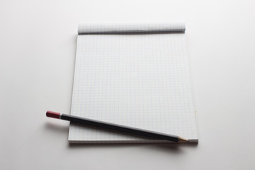 Empty notepad and  pen