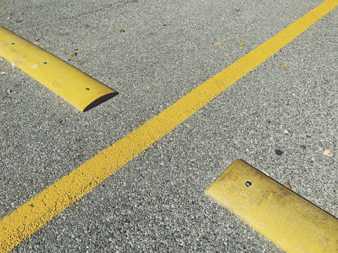 Detail of speed bumps on urban street
