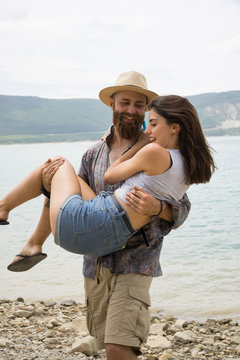 Cheerful couple on beach