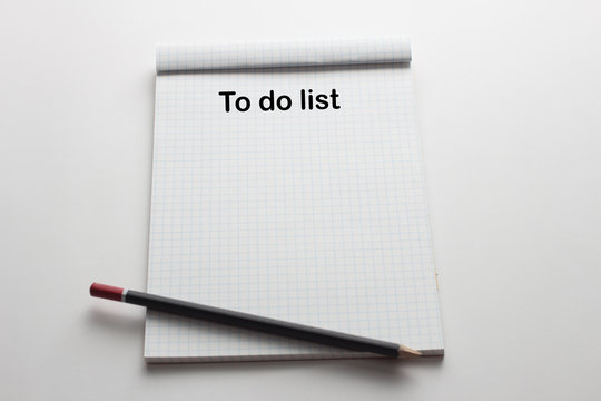 To do list on notepad and  pencil