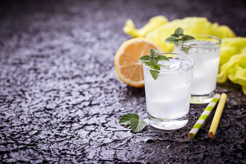 Cold drink with lemon and mint