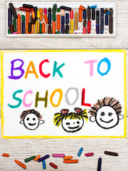 Photo of  colorful drawing: Word BACK TO SCHOOL and happy children. First day at school.