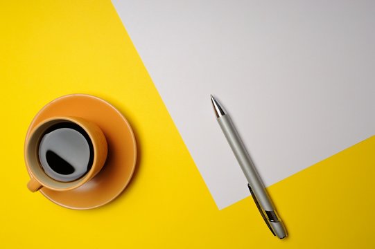 Turkish Coffee White Paper With Metalic Pen On Yellow Table