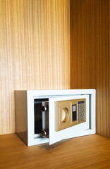 Safe box and wood wardrobe in hotel