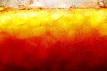 Mixed cold iced tea in a glass container