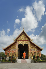 Fototapeta premium buddhist temple with monk