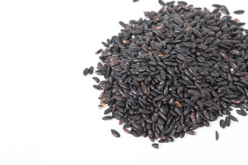 Black rice isolated on white background.