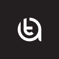 Initial lowercase letter logo at, ta, t inside a, monogram rounded shape, white color on black background

