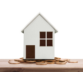 House on pile of coins,money