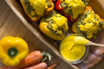 Peppers stuffed with quinoa and avocado pesto