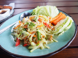 Thai papaya spicy salad in the restaurant