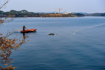 Fish man on lake