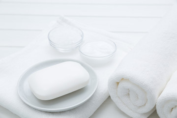 Obraz na płótnie Canvas All White Spa and Bath Image - Towels, Soap, Bath Salt and Cosmetic Cream