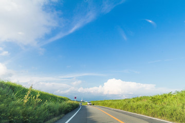 Beautiful landscape   a country road of mountain view  in spring day with  blue sky  background of  Yamanashi Prefecture, Japan .