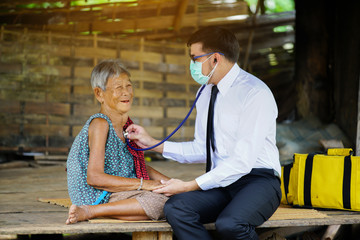 Family medicine visits the  elderly woman in rural