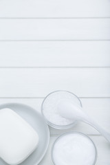 Fototapeta na wymiar All White Spa and Bath Image - Towel, Soap, Bath Salt and Cosmetic Cream