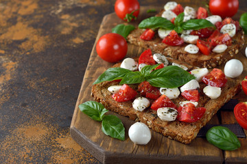 Bruschetta with mozzarella and basil